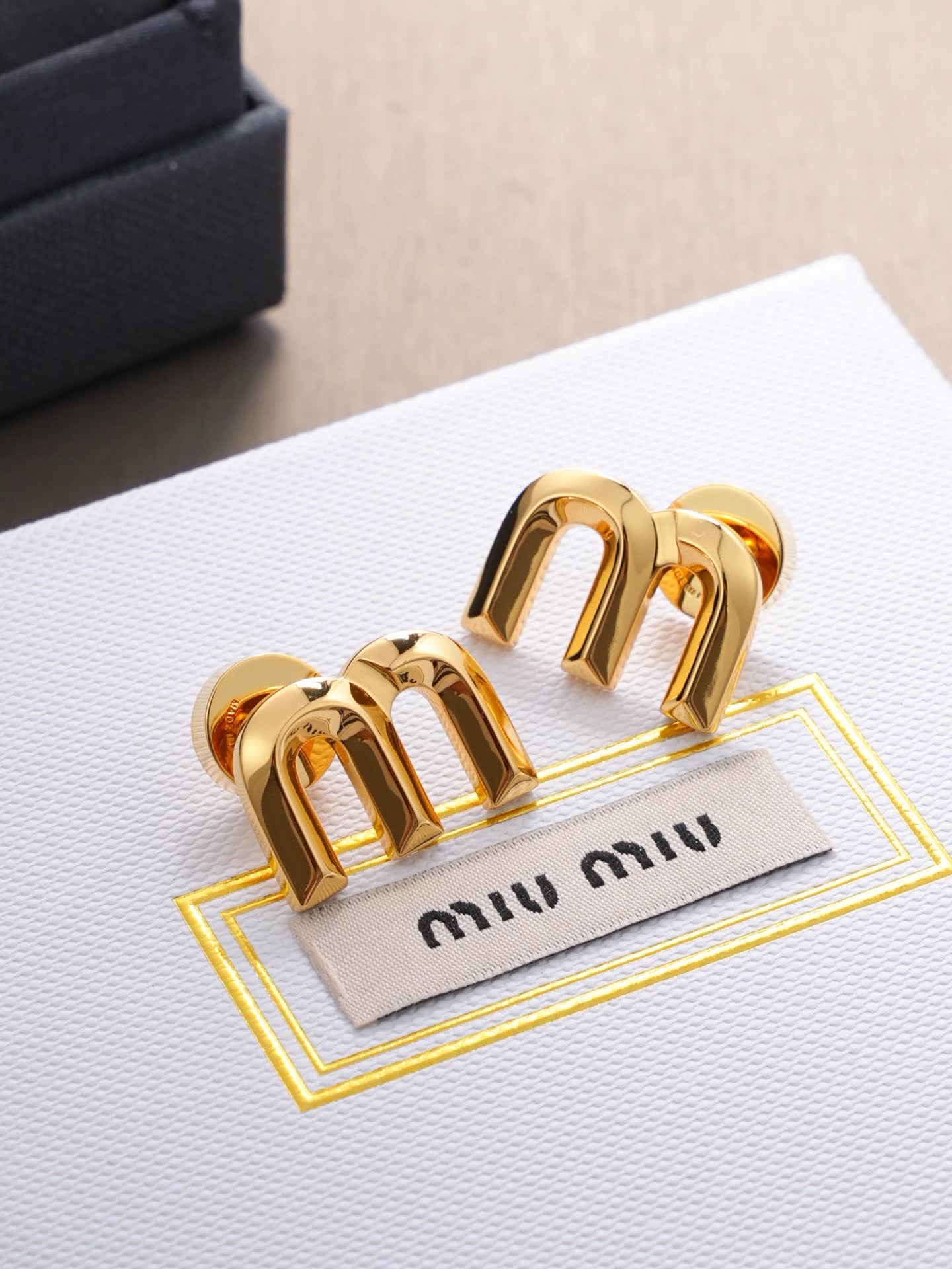 Miu Miu Gold Tone 'M' Stud Earrings